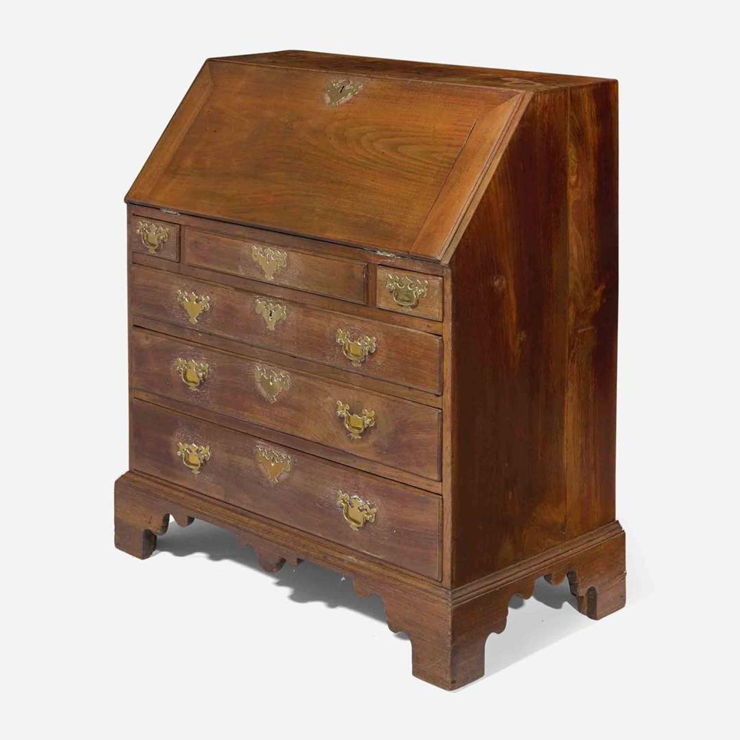 A Chippendale carved walnut slant-front desk Probably Pennsylvania, 18th century