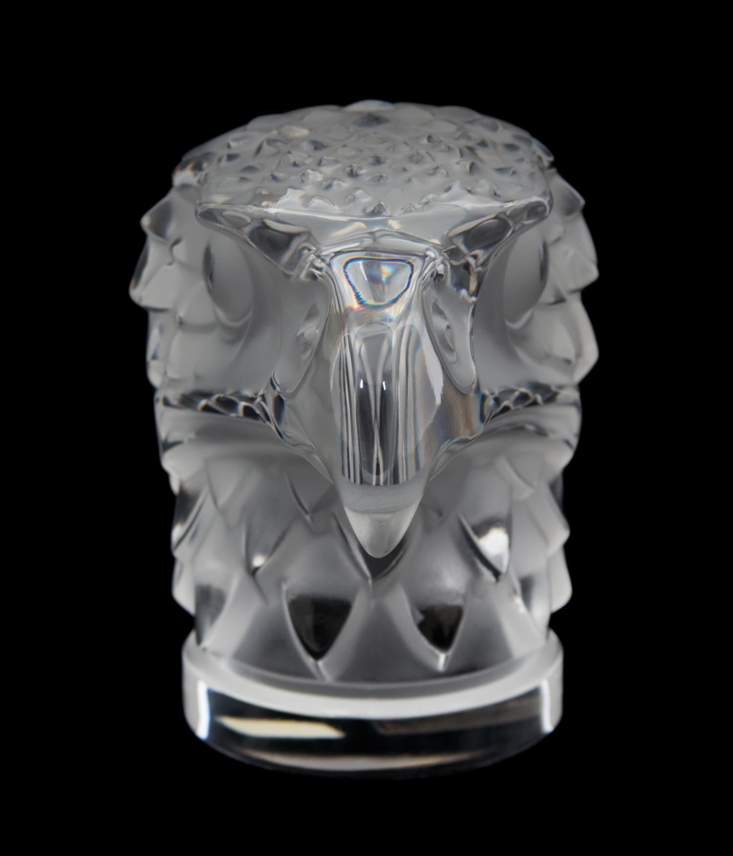 A Lalique Molded and Frosted Glass Tete D'Aigle Height 4 1/2 inches. — 20TH CENTURY