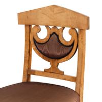 A Set of Four Biedermeier Side Chairs