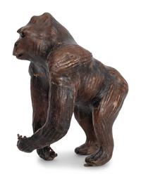 Two Leather Clad Animal Figures