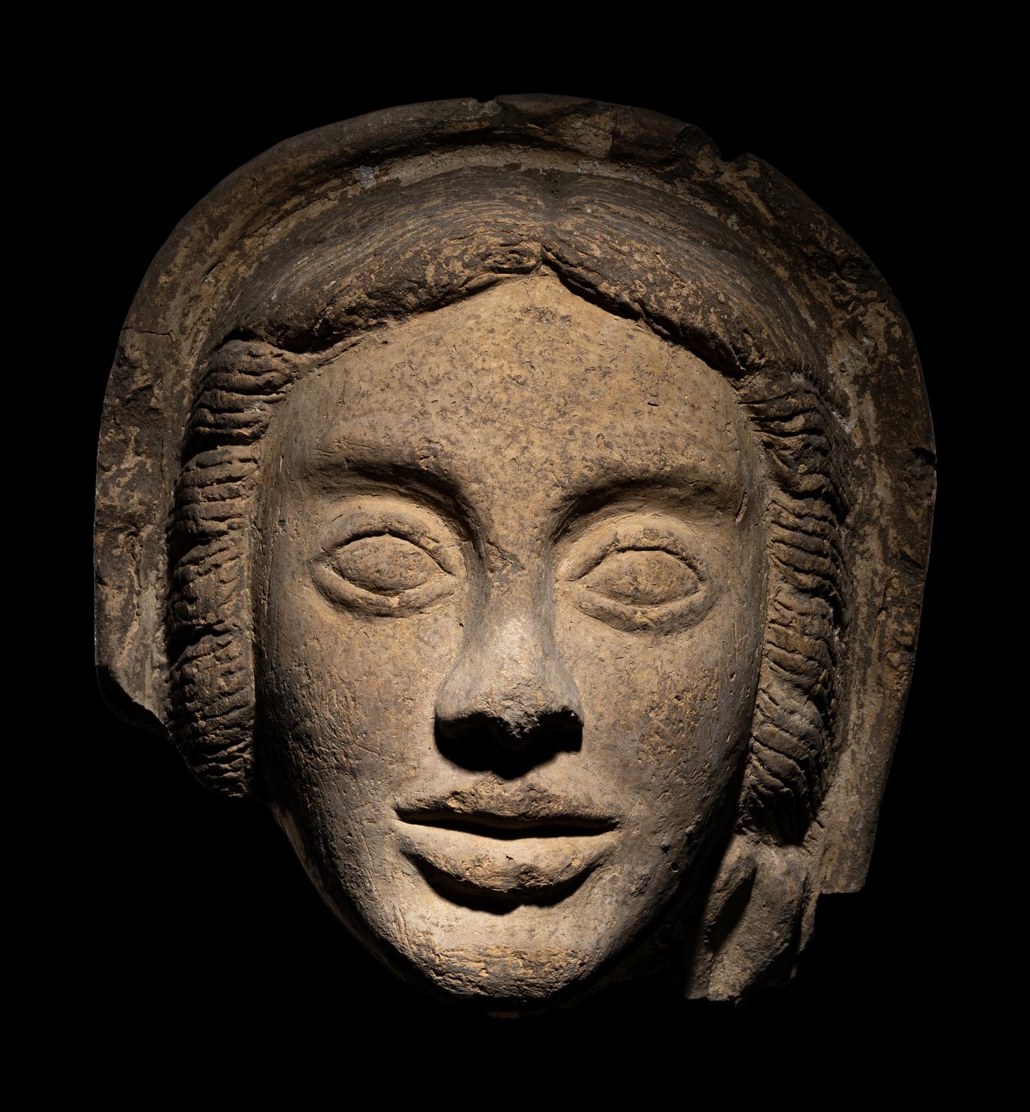 An Etruscan Terracotta Votive Head of a Woman