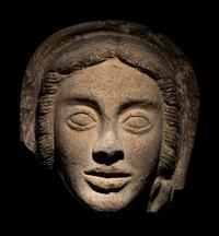 An Etruscan Terracotta Votive Head of a Woman