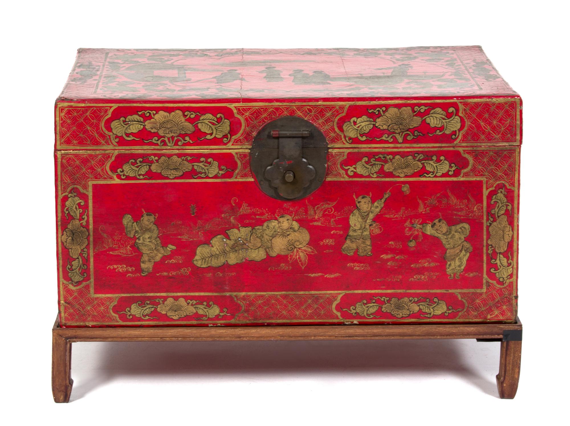 A Chinese Red and Gilt Lacquer Bride's Box Height 15 x width 29 x depth 20 1/2 inches.
