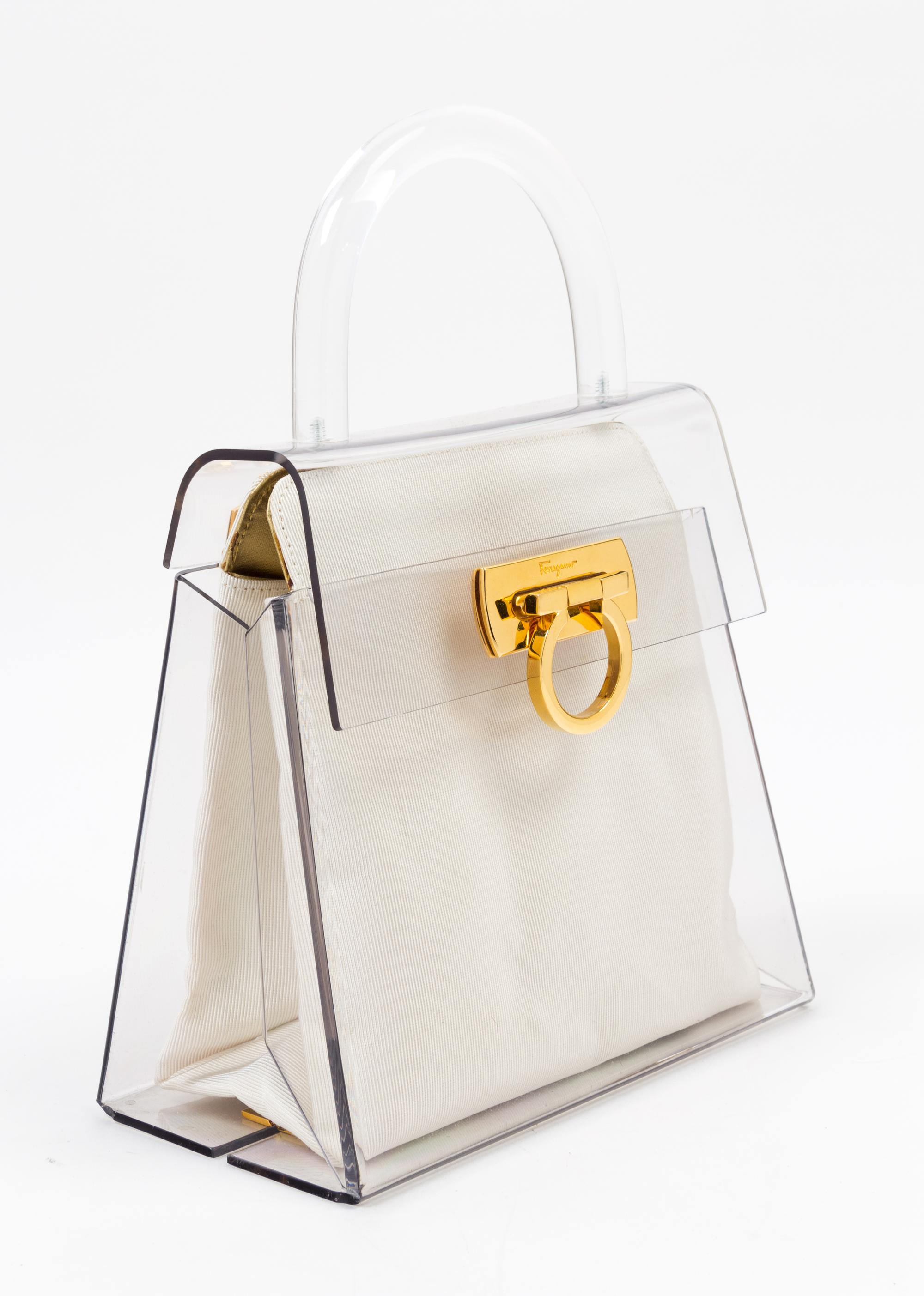 A Salvatore Ferragamo Lucite Top Handle Handbag, 7.75" x 7.75" x 4"; Handle drop: 3".