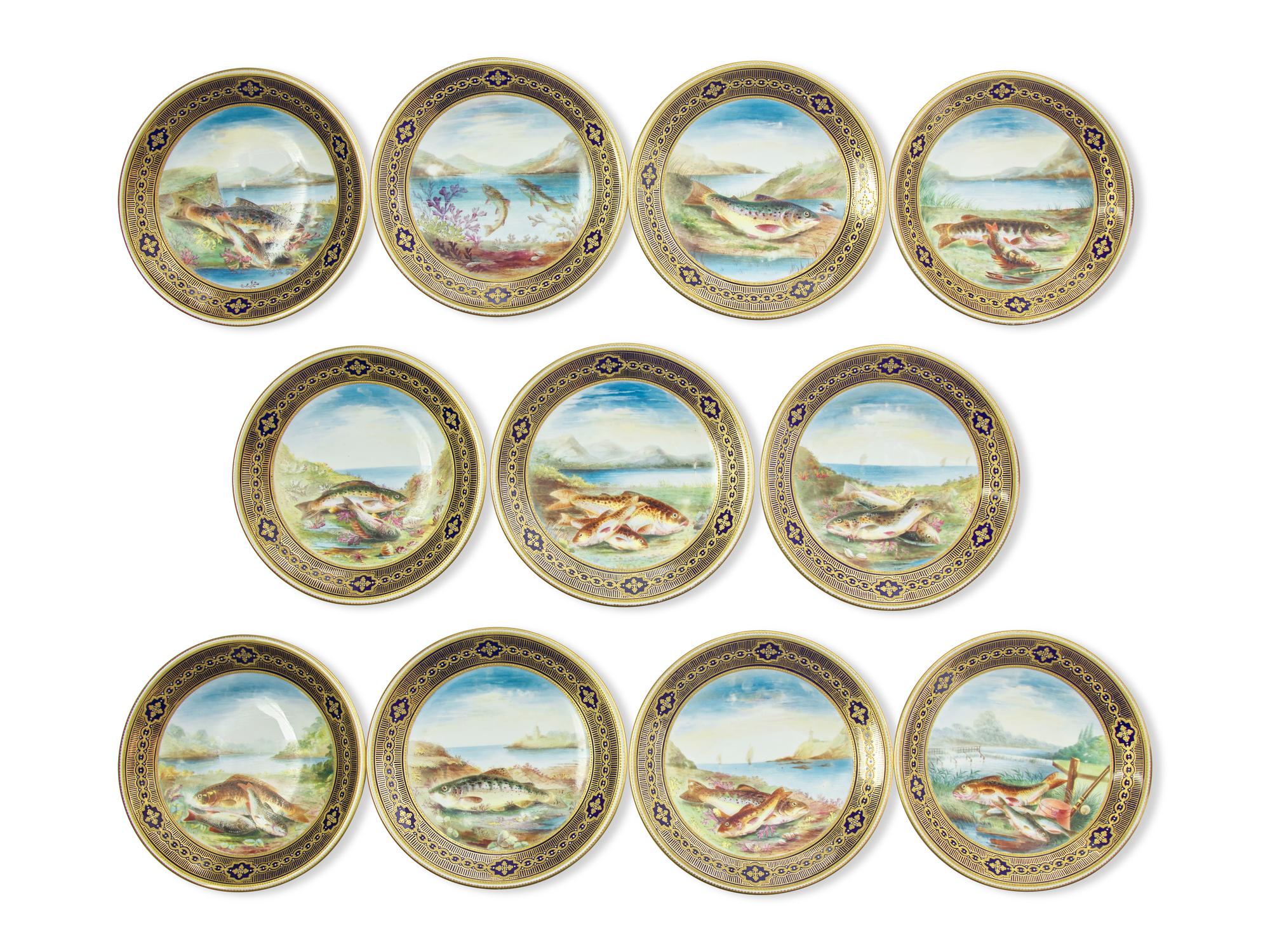 A Set of Eleven Royal Crown Derby Hand-Painted and Parcel-Gilt Fish Plates