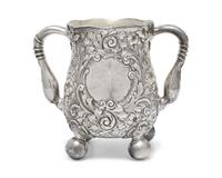 An Aesthetic Movement Sterling Silver Floral Repousse Loving Cup