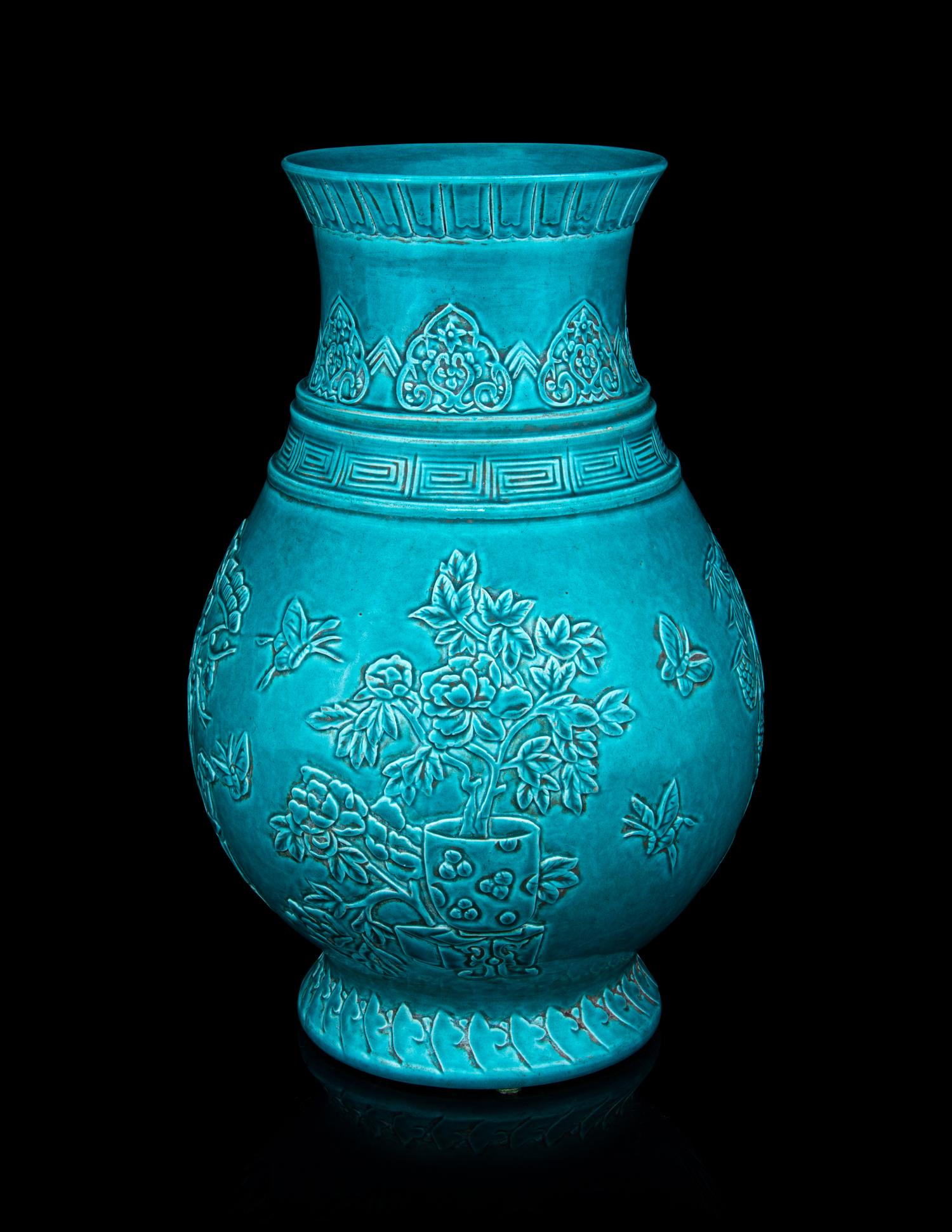 A Carved Turquoise-Glazed Porcelain Hu Vase