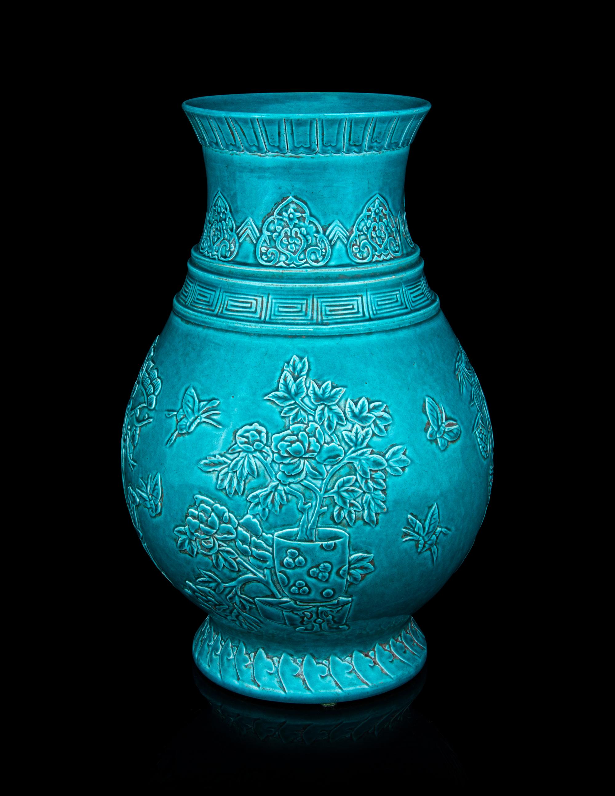 A Carved Turquoise-Glazed Porcelain Hu Vase