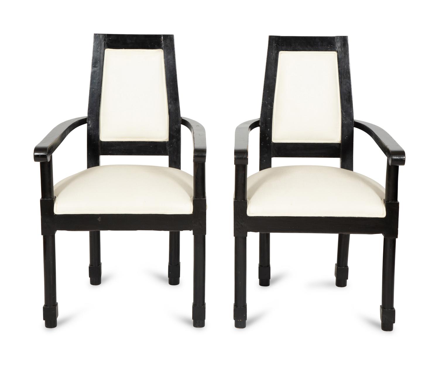 A Pair of Continental Ebonized Armchairs