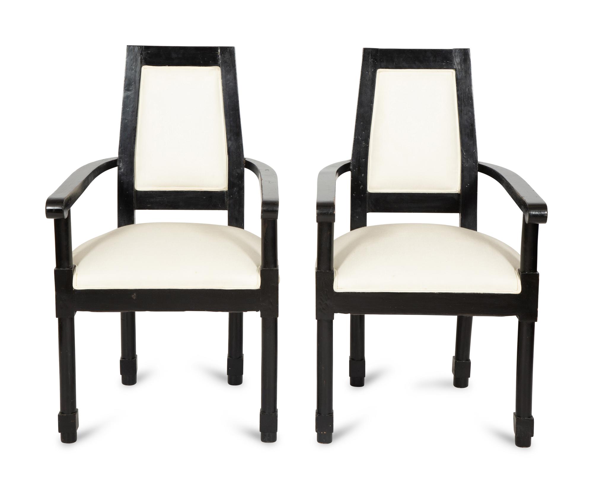 A Pair of Continental Ebonized Armchairs