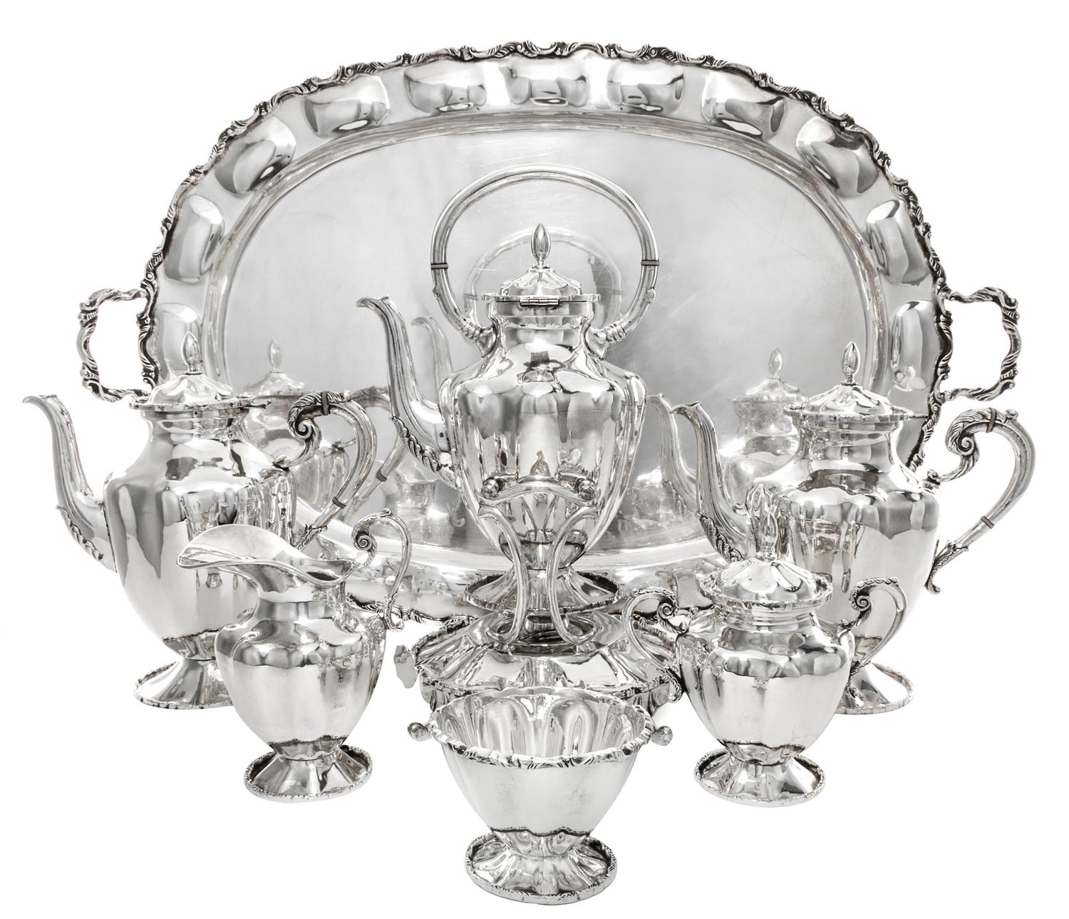 A Mexican Silver Six-Piece Tea and Coffee Service, Jose Luis Flores, Taxco, comprising a kettle on lampstand, a teapot, a coffee pot, a
