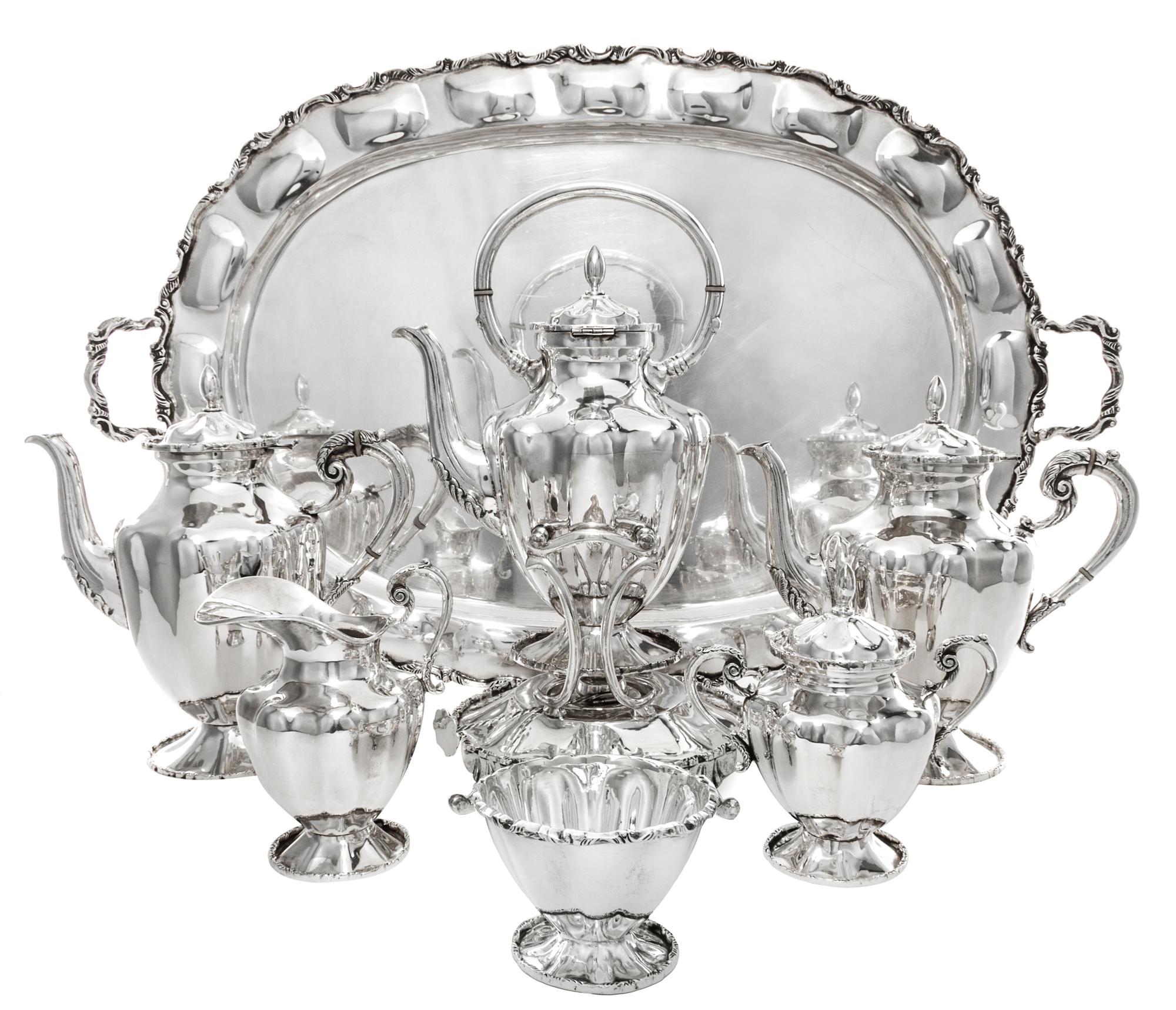 A Mexican Silver Six-Piece Tea and Coffee Service, Jose Luis Flores, Taxco, comprising a kettle on lampstand, a teapot, a coffee pot, a