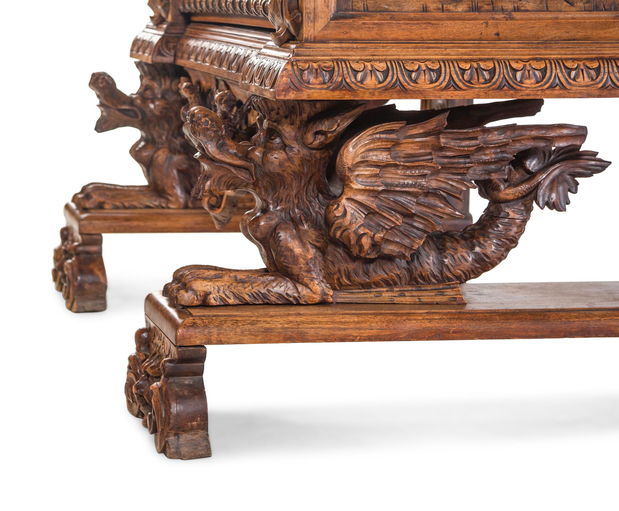 An Italian Renaissance Revival Carved Walnut Cassone on Stand