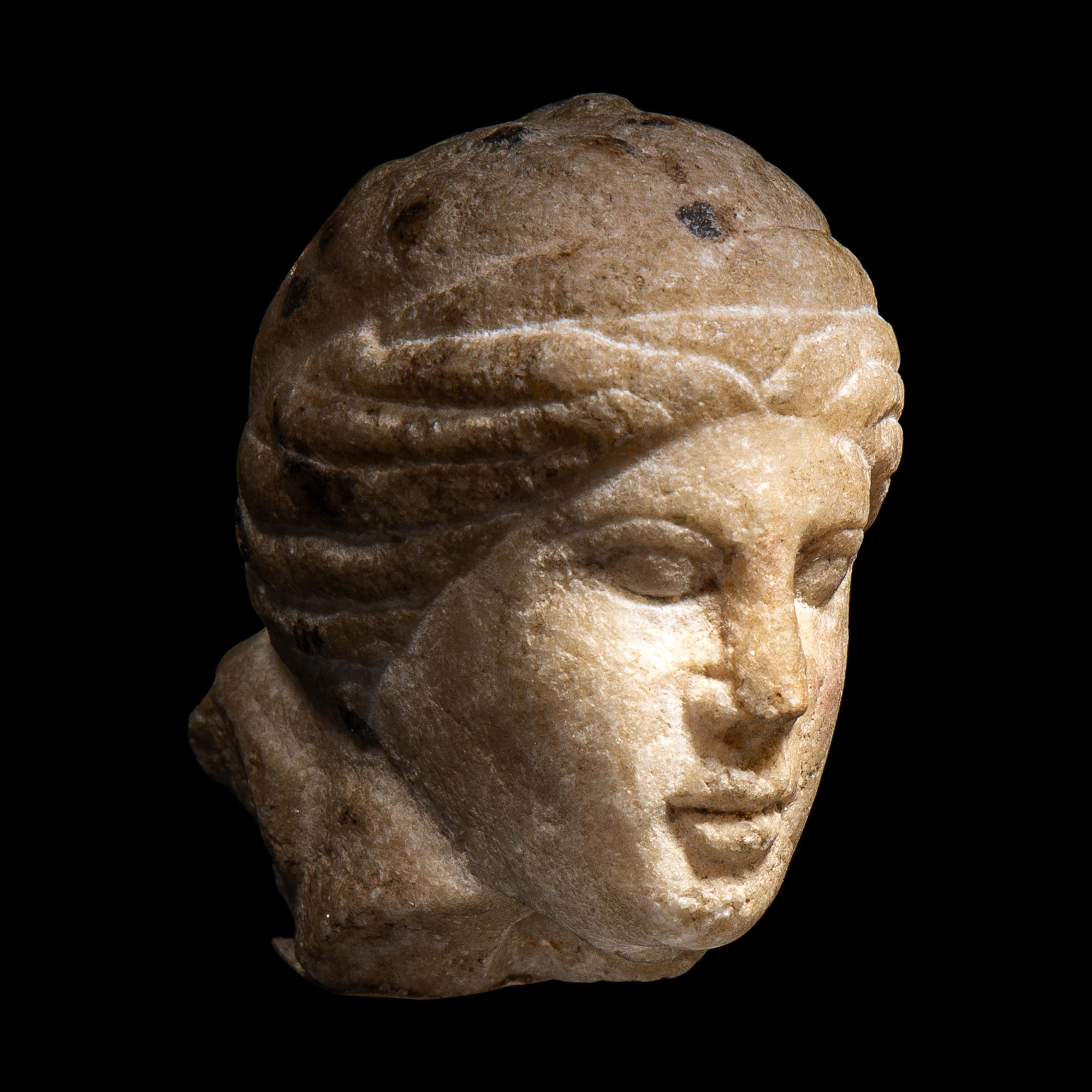 A Roman Marble Head of a Woman
