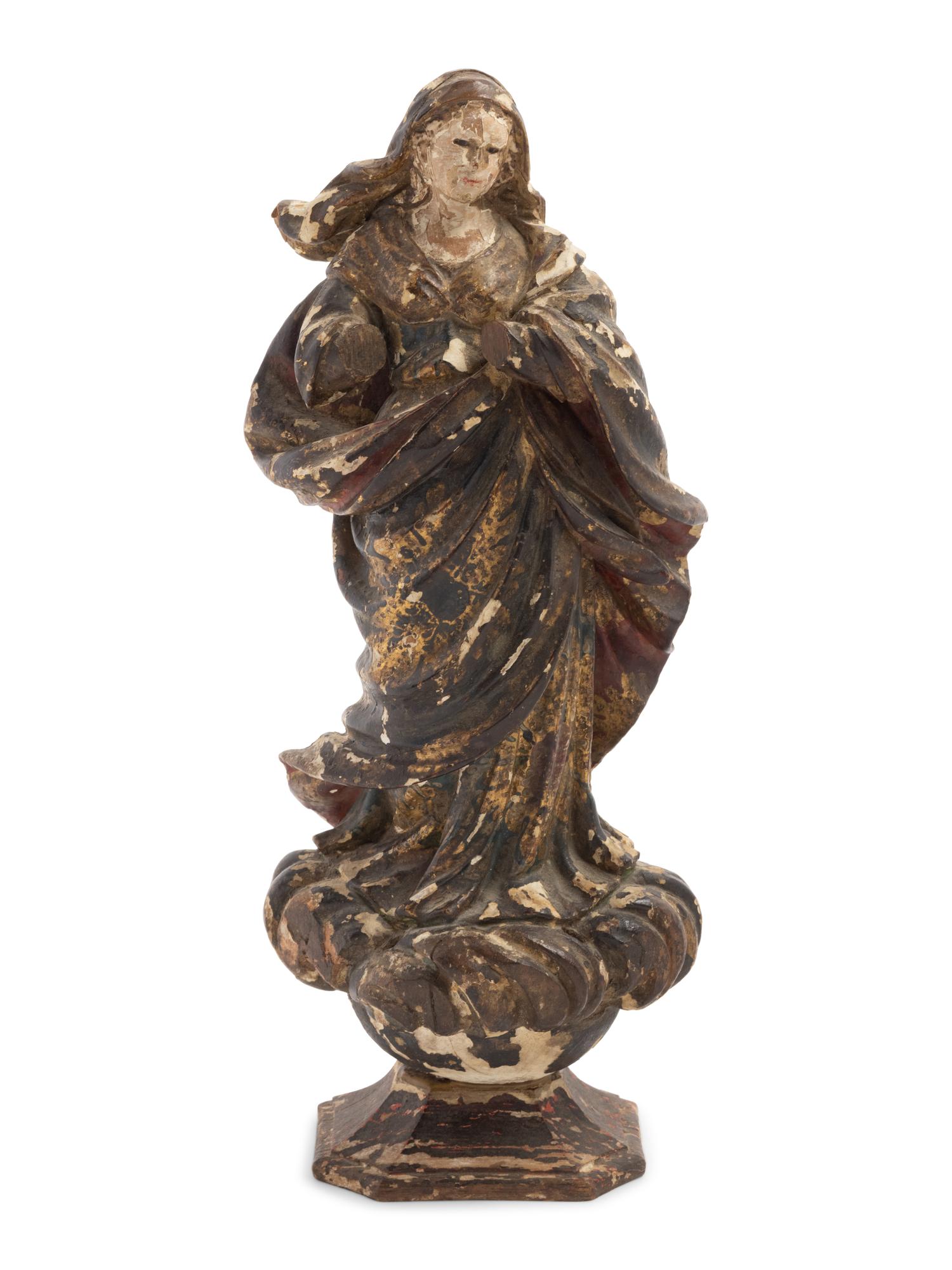 A Continental Painted and Parcel Gilt Carved Wood Figure of an Angel