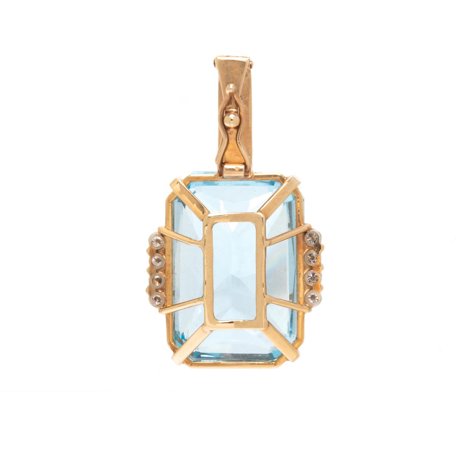 YELLOW GOLD, BLUE TOPAZ, AND DIAMOND PENDANT