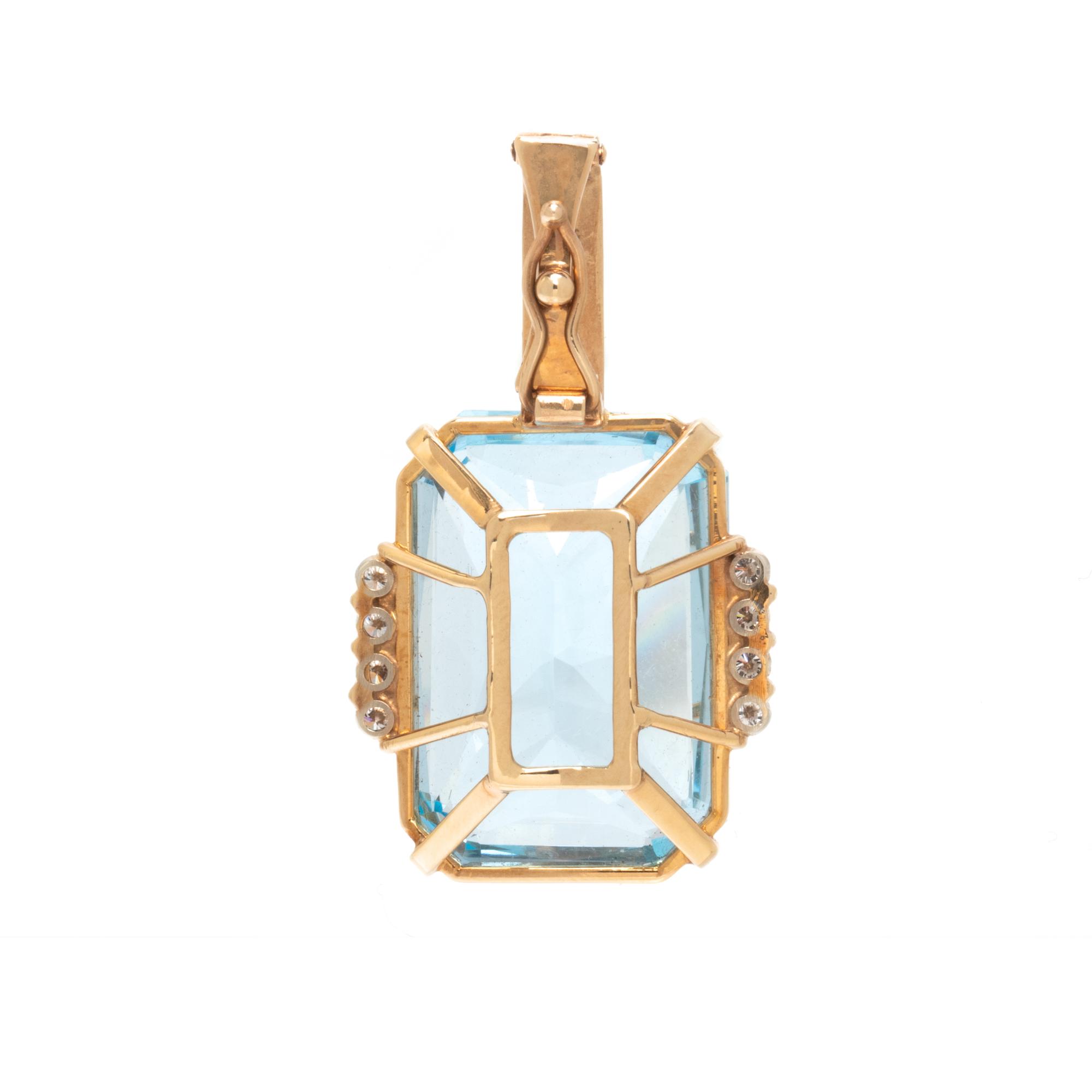 YELLOW GOLD, BLUE TOPAZ, AND DIAMOND PENDANT