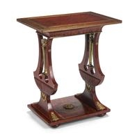 An Empire Style Mahogany and Gilt Bronze Mounted Table