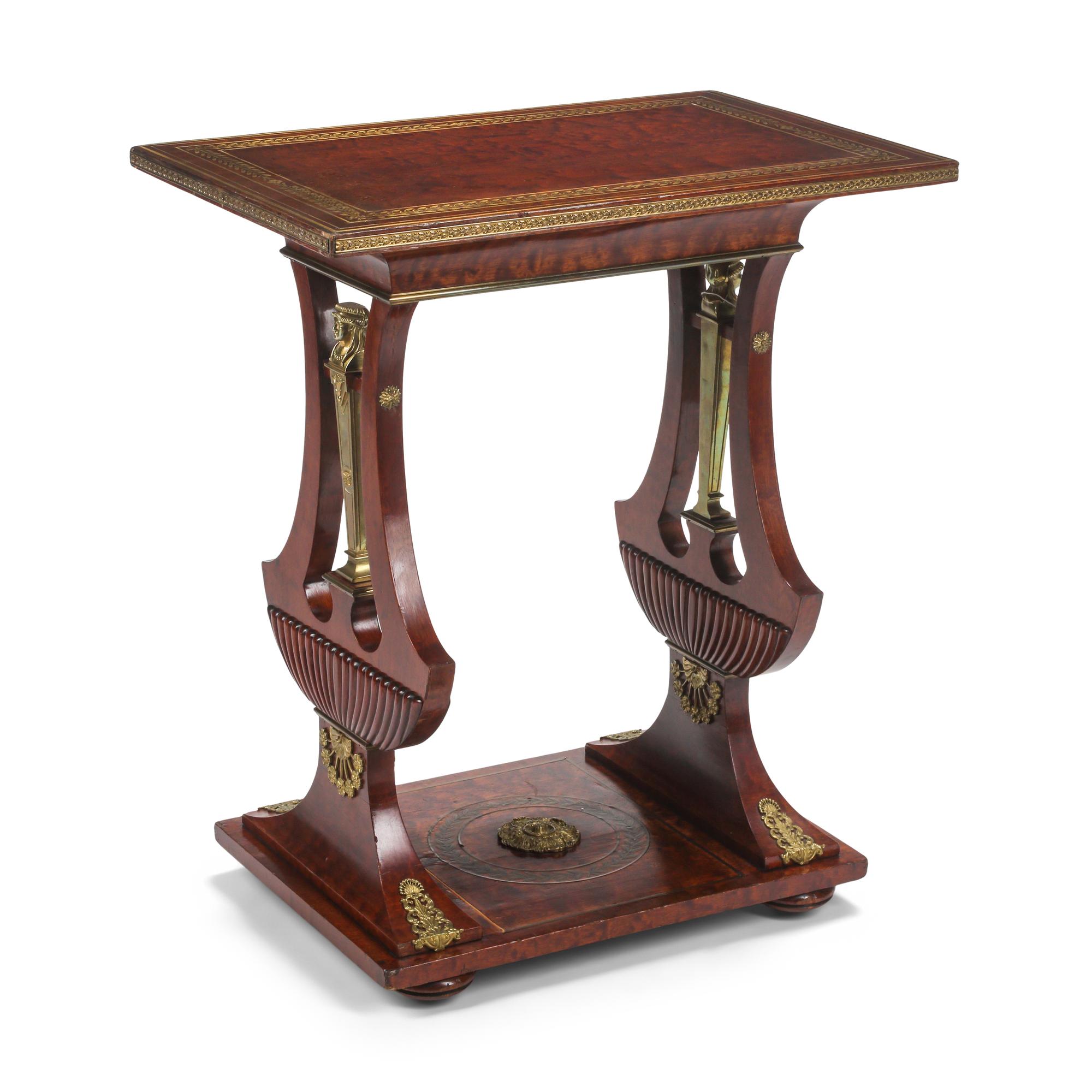 An Empire Style Mahogany and Gilt Bronze Mounted Table