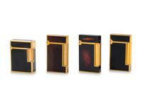A Group of Four St. DuPont Lighters