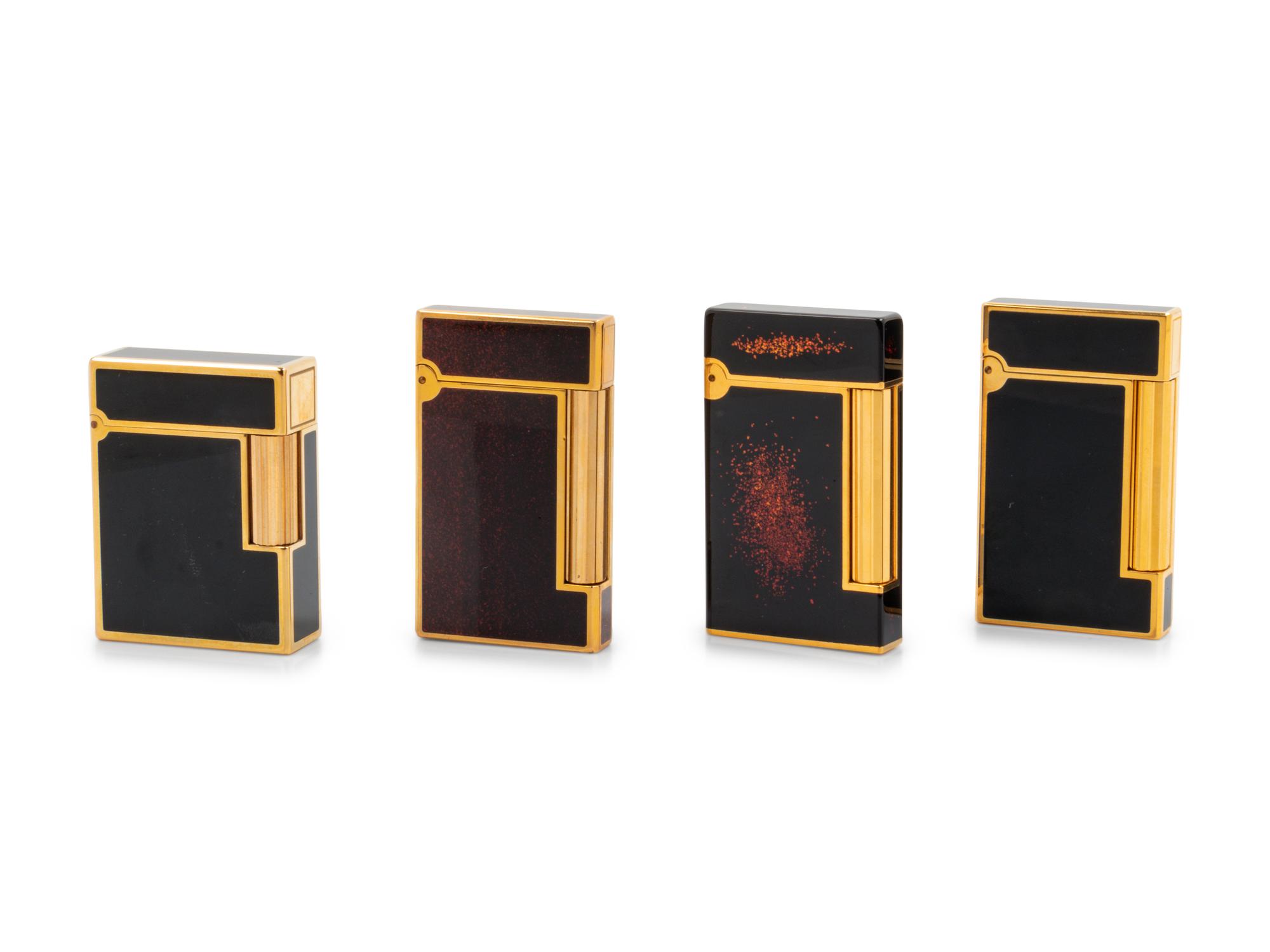 A Group of Four St. DuPont Lighters