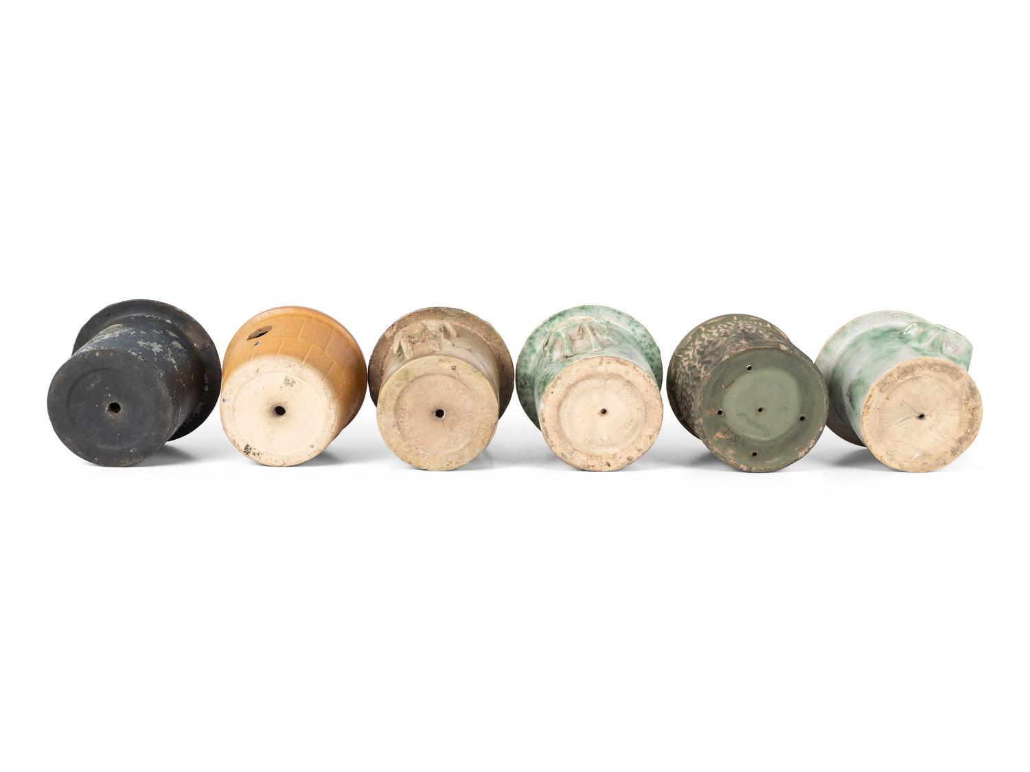 Six Stoneware Birdhouses, Including Dalton Pottery