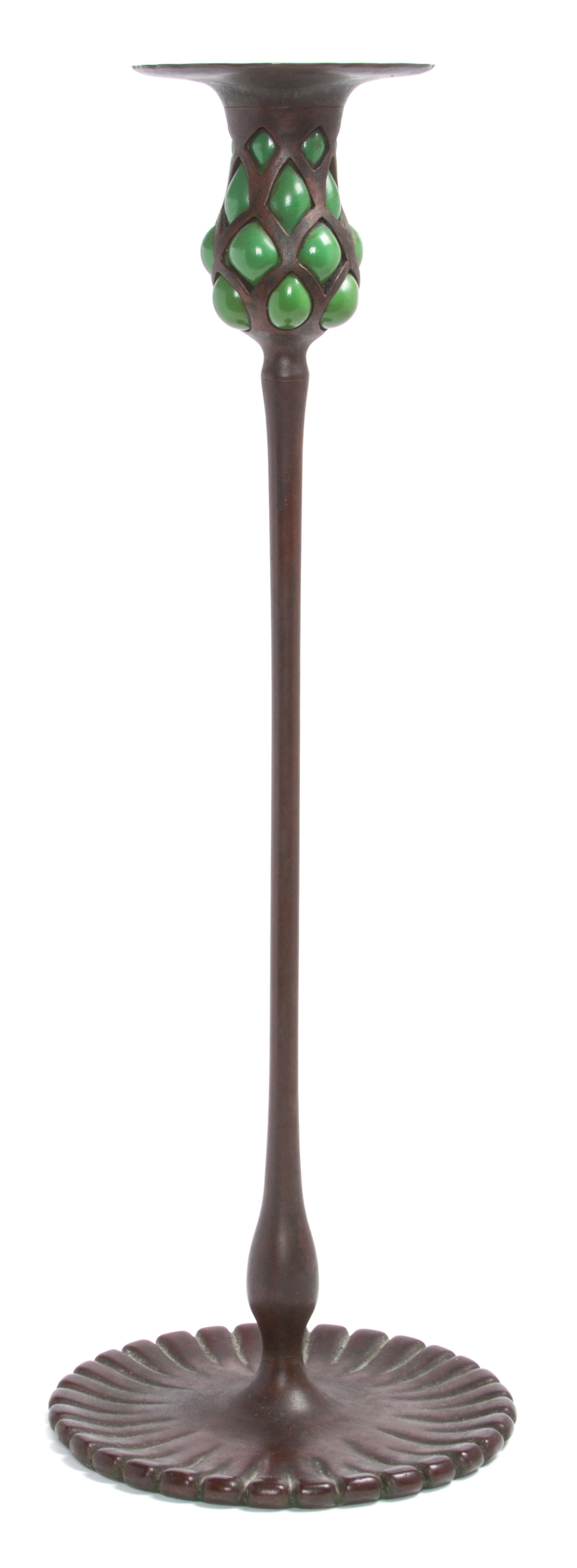 An American Bronze Blown-Out Candlestick Height 17 3/4 inches. — Tiffany Studios, New York