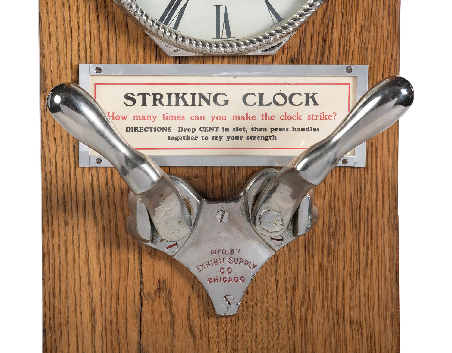 An Exhibit Supply Co. One Cent Striking Clock Game