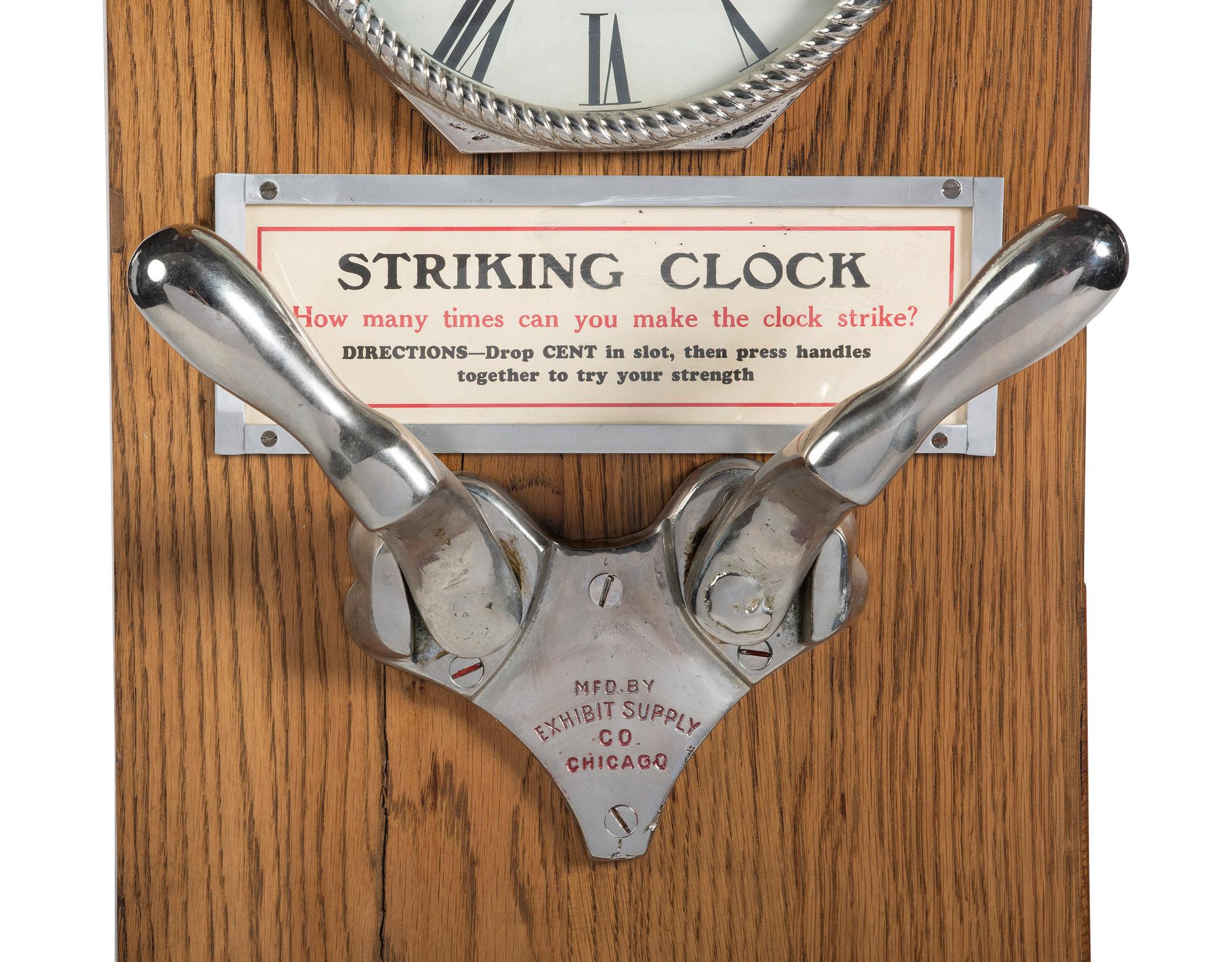 An Exhibit Supply Co. One Cent Striking Clock Game