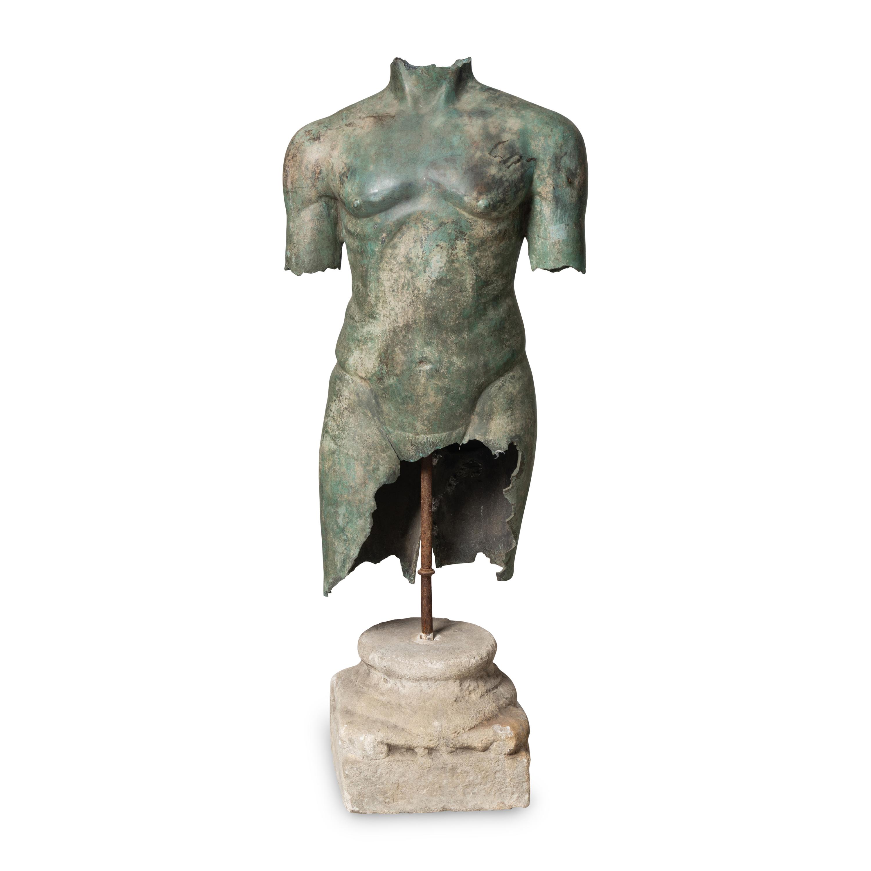 A Patinated Bronze Torso on Stone Plinth