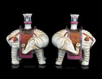 A Pair of Chinese Famille Rose Porcelain Elephant-Form Candle Holders