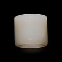 A Chinese white jade archer's ring inscribed with poem 白玉詩文扳指