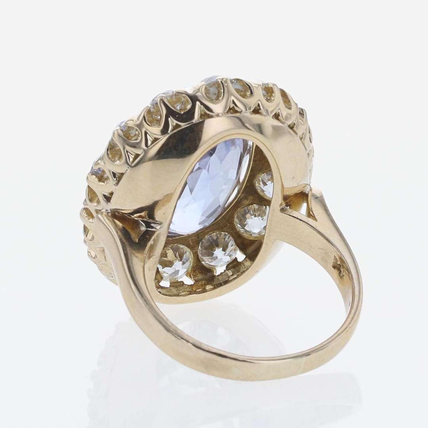 A Sapphire, Diamond, and 14K Yellow Gold Ring