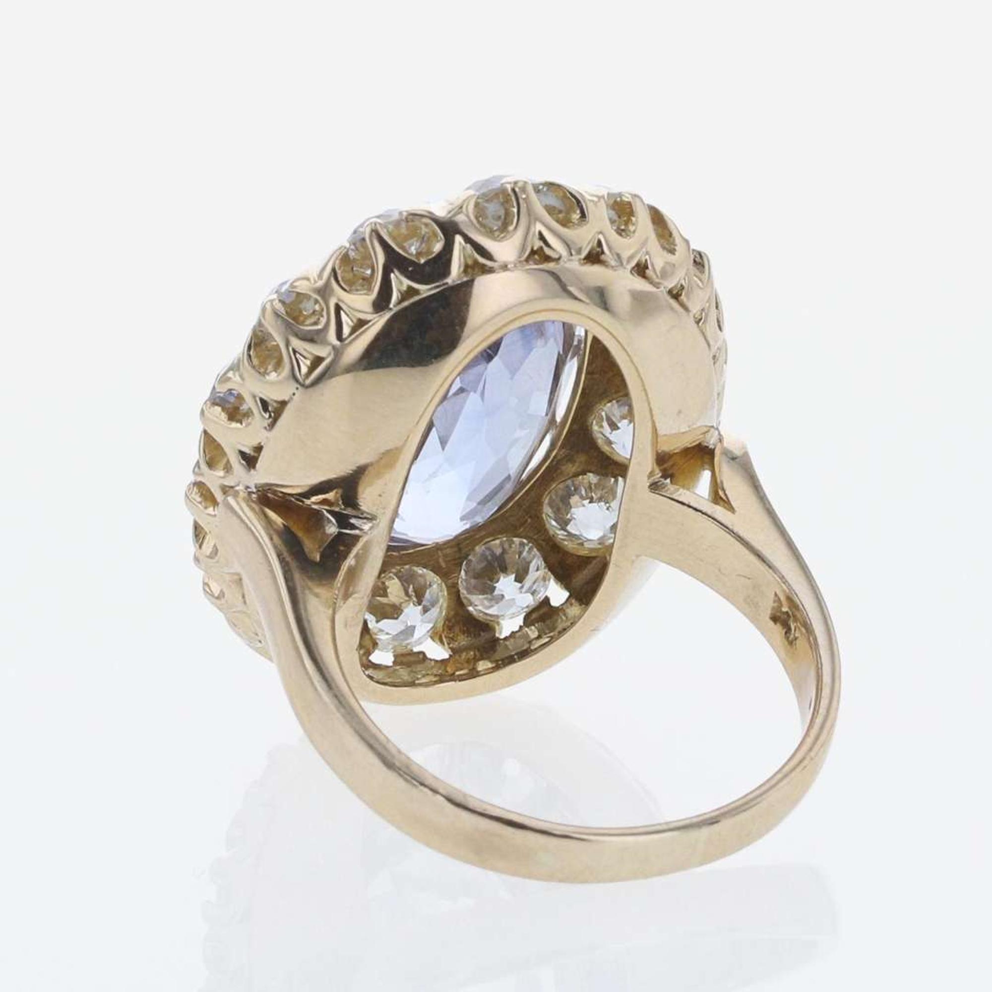 A Sapphire, Diamond, and 14K Yellow Gold Ring