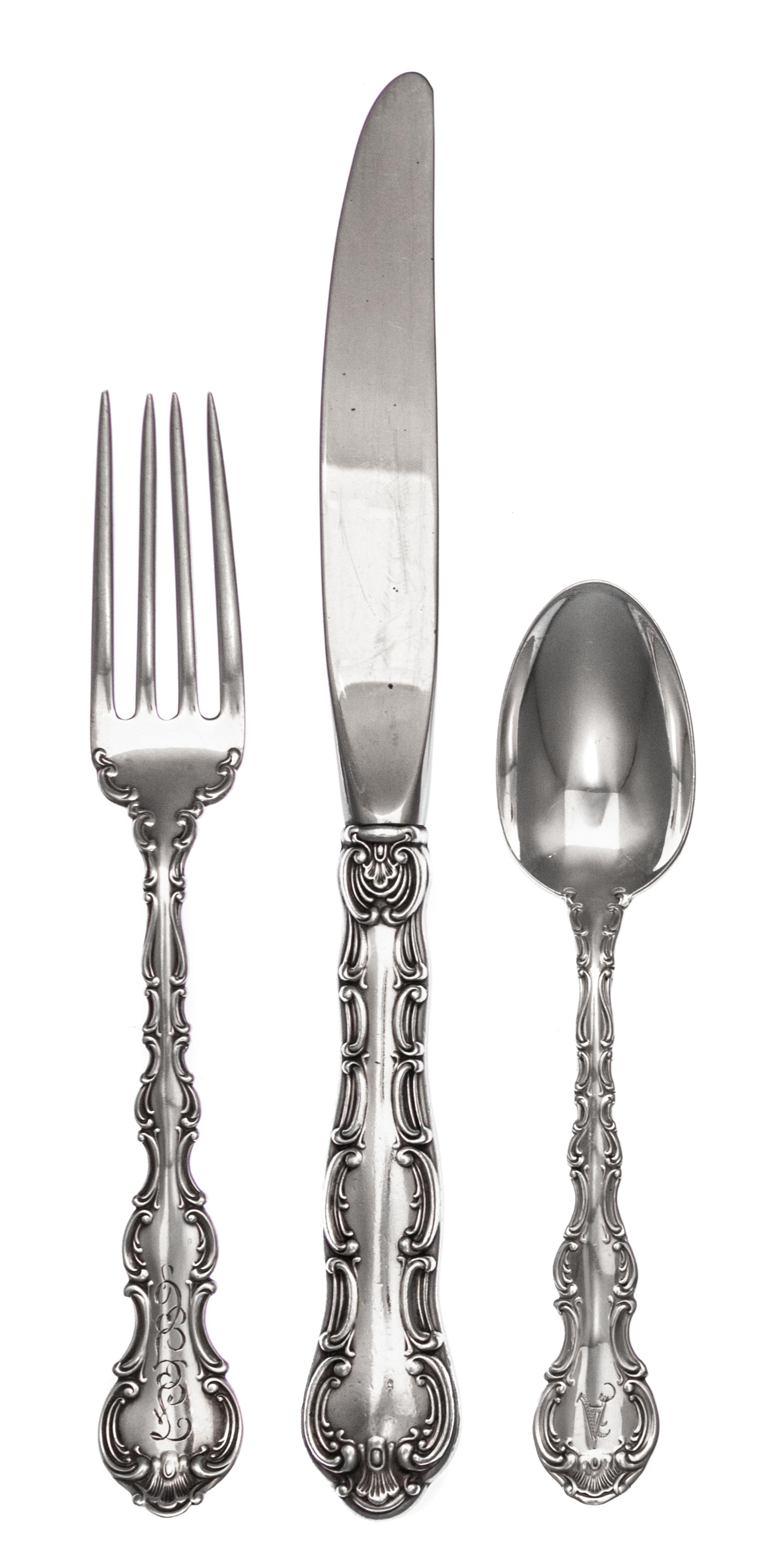 An American Silver Flatware Service, Gorham Mfg. Co., Providence, RI, Strasbourg pattern, comprising: 33 dinner knives 33 dinner forks