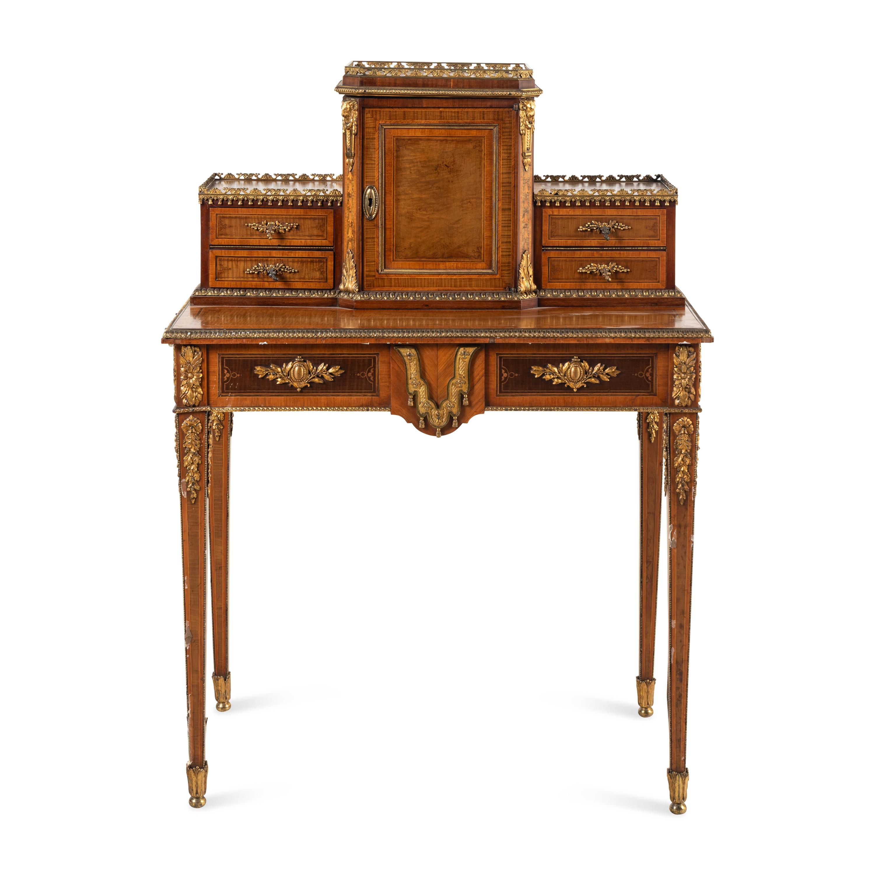 A Louis XVI Style Kingwood, Satinwood and Gilt Bronze Mounted Bonheur du Jour