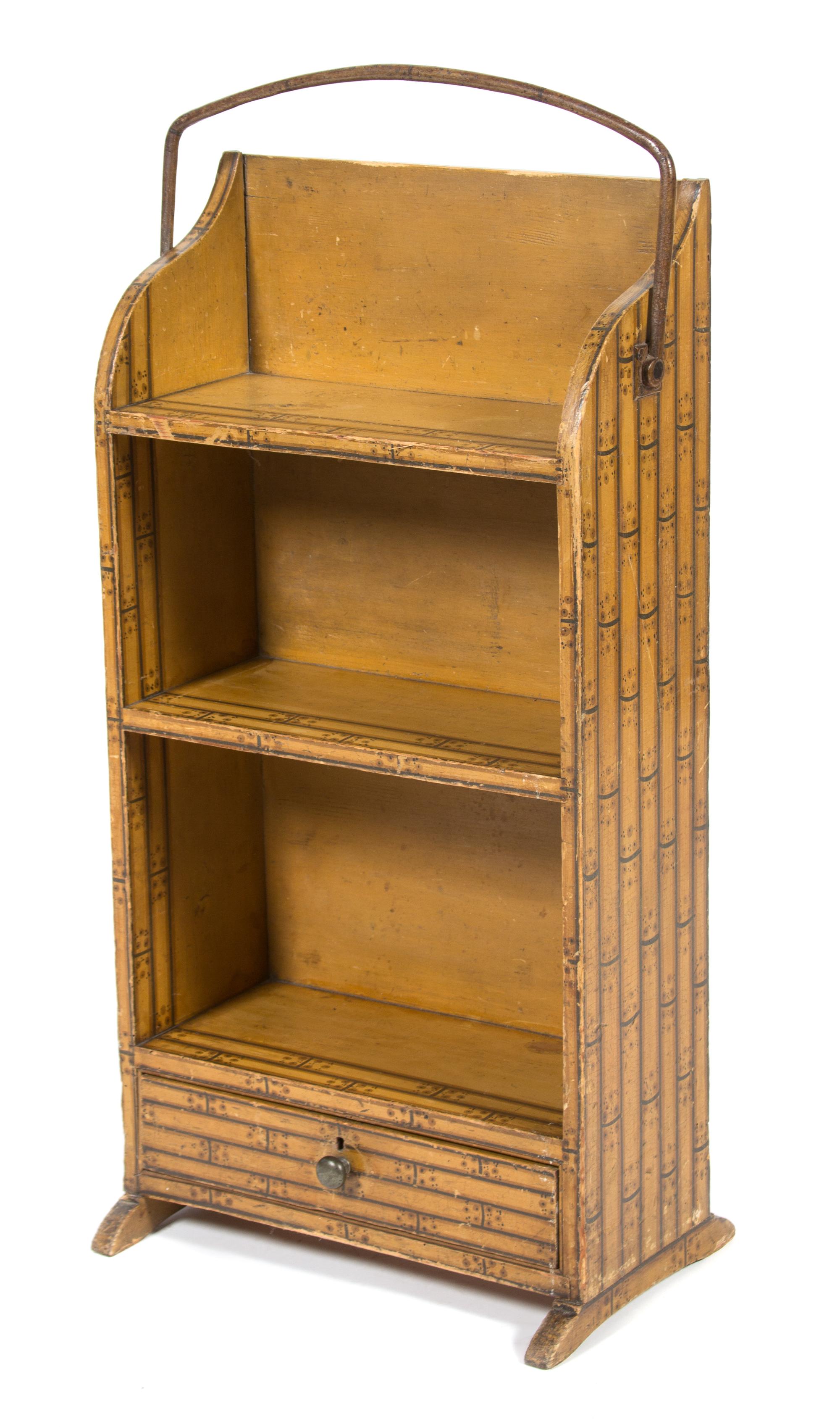 A Faux Bamboo Painted Pine Bookshelf with Iron Swing Handle Height 30 1/2 x width 15 1/2 x depth 10 inches. — 20TH CENTURY