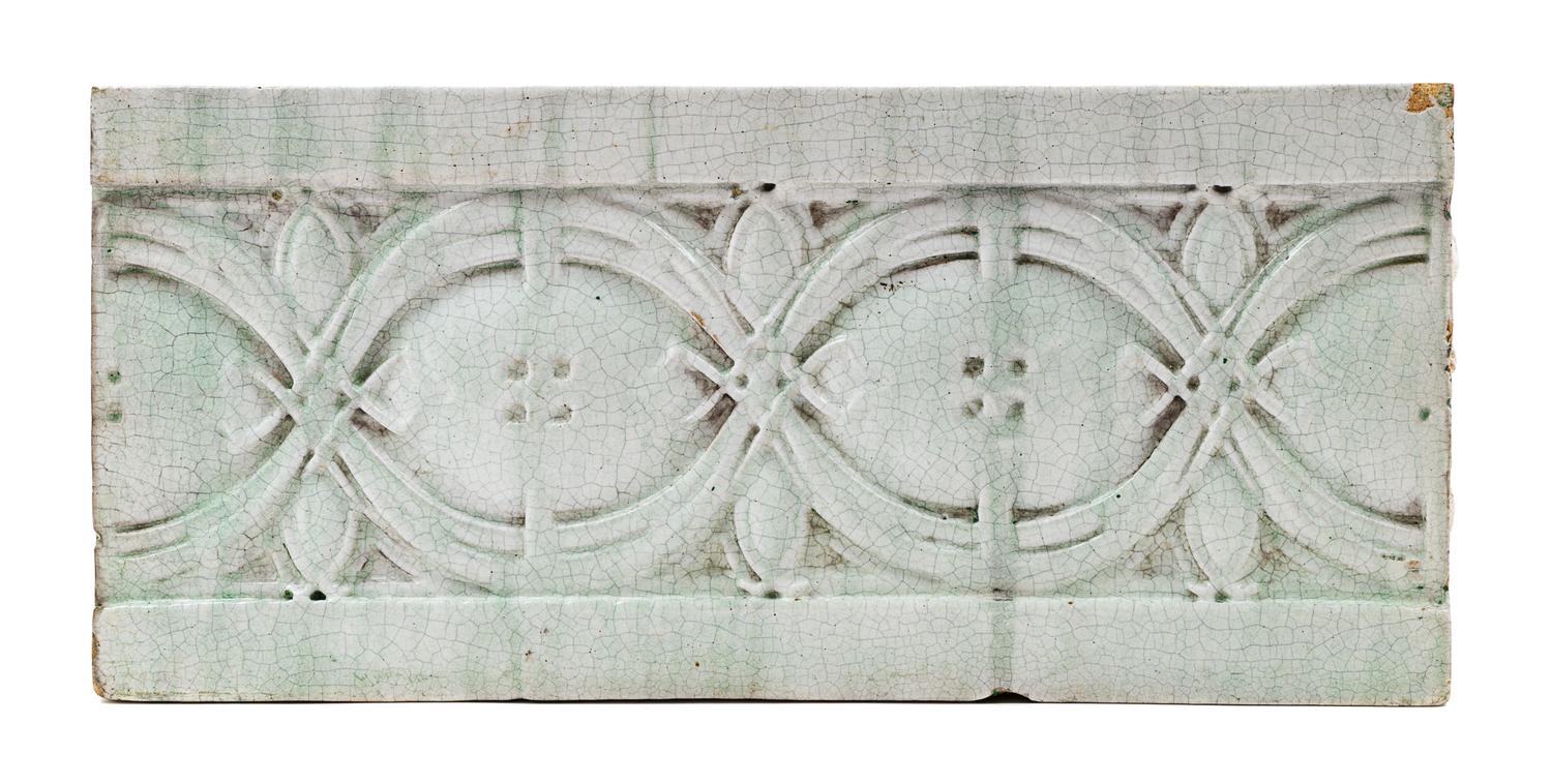 A Louis Sullivan Glazed Terra Cotta Block Width 17 3/4 inches. — EARLY 20TH CENTURY