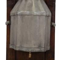 An Italian Carved Walnut Lavabo with Pewter Cistern and Basin