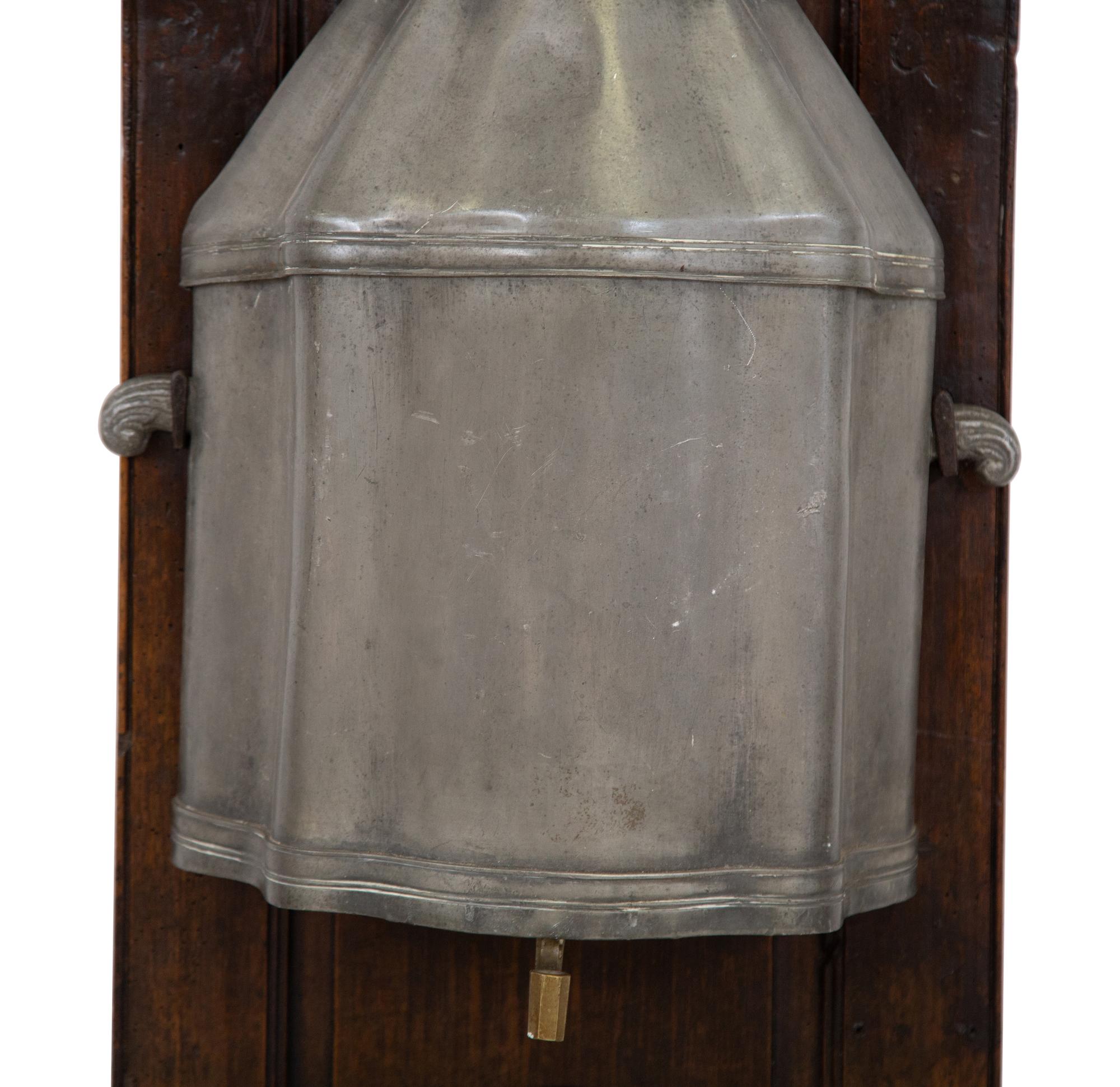 An Italian Carved Walnut Lavabo with Pewter Cistern and Basin