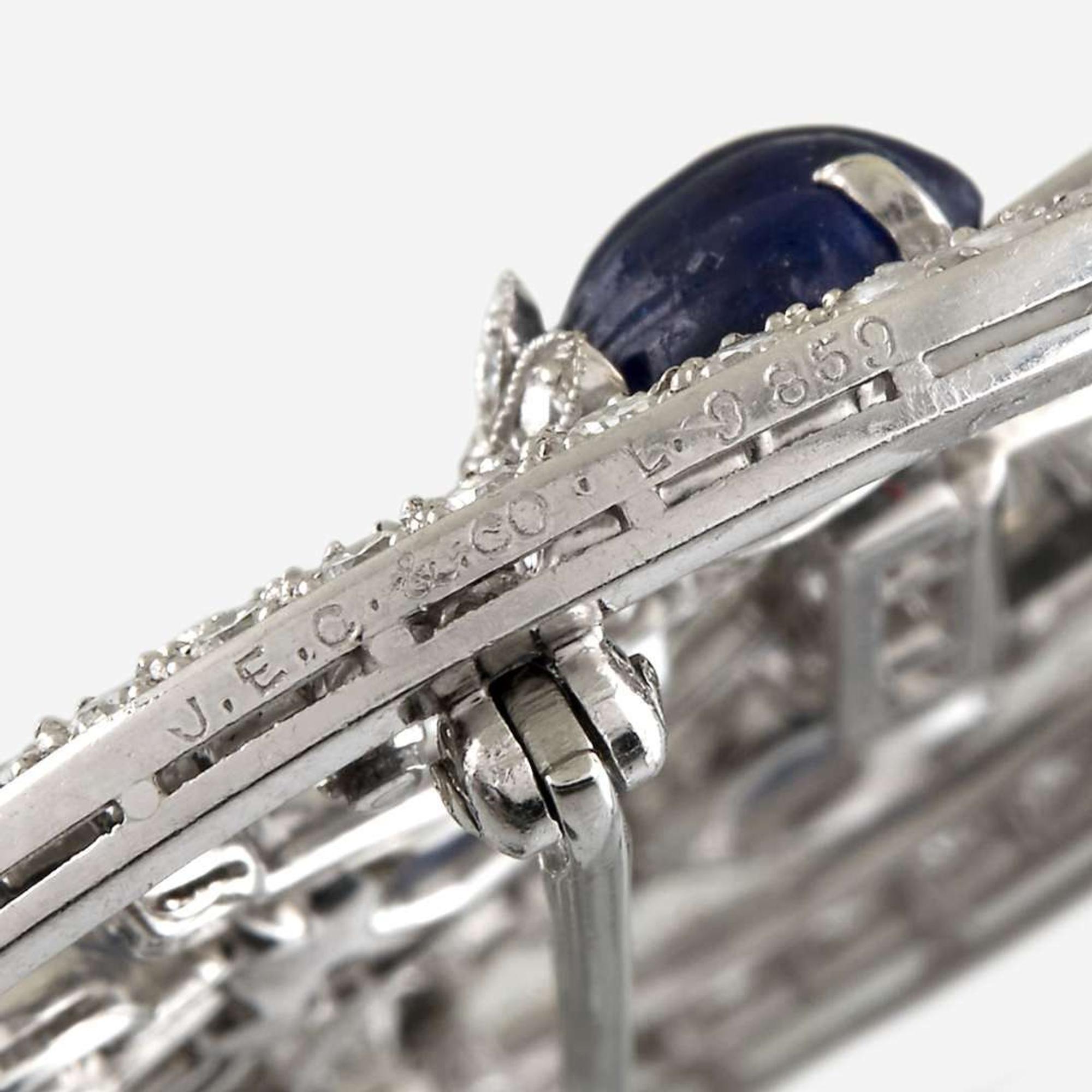 A diamond, carved sapphire, and platinum brooch, J. E. Caldwell & Co.