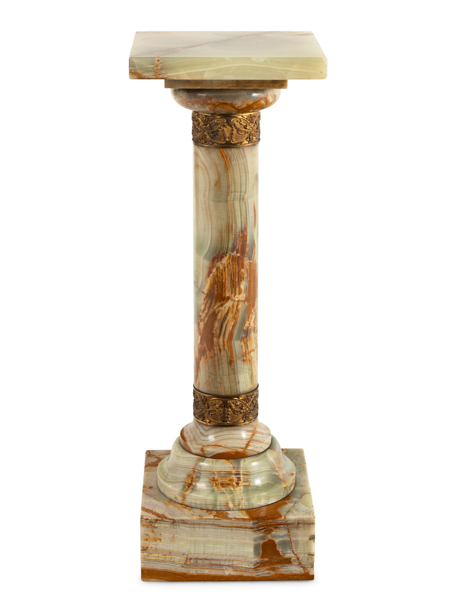 A Continental Gilt Bronze Mounted Onyx Pedestal