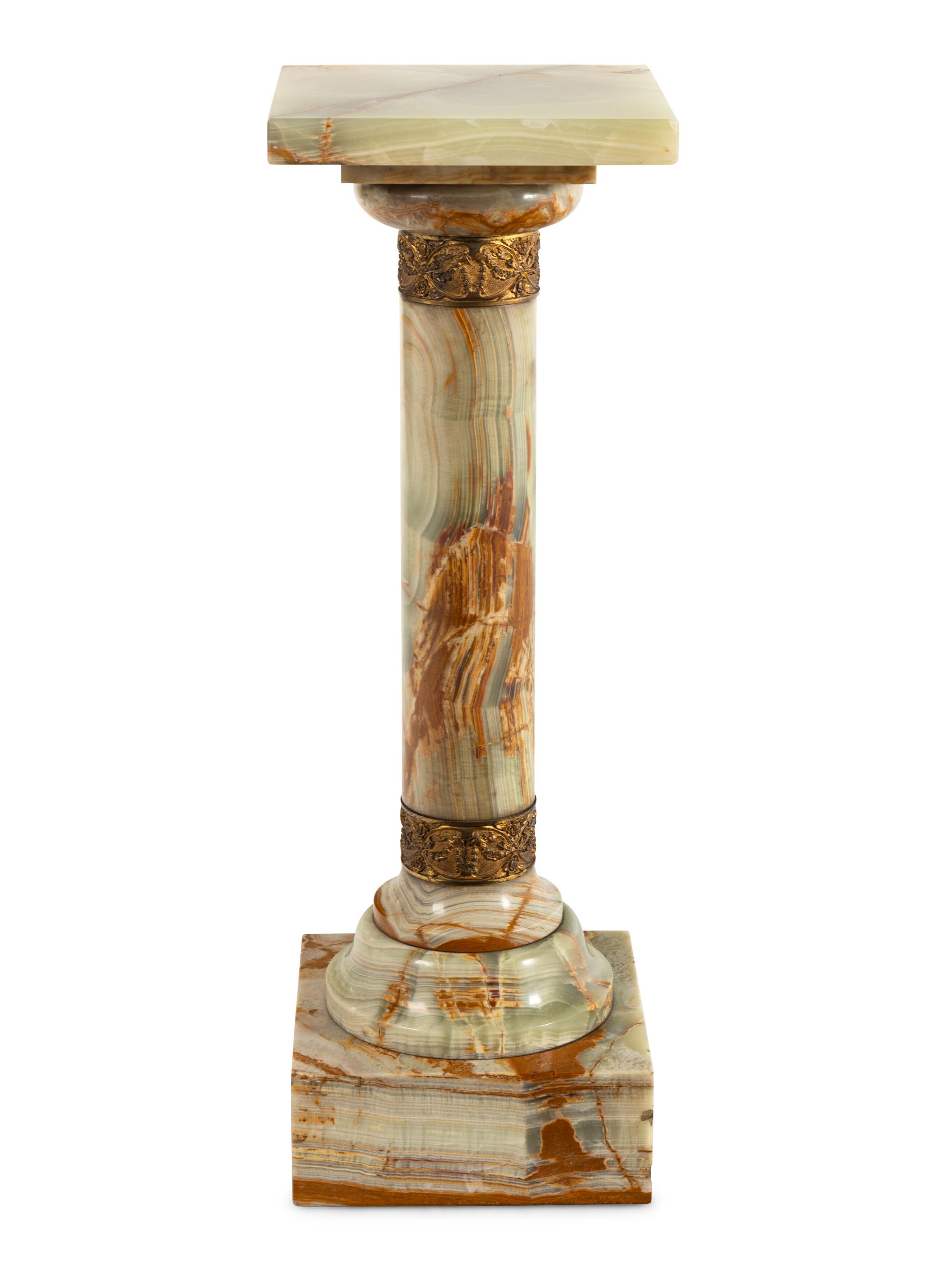 A Continental Gilt Bronze Mounted Onyx Pedestal