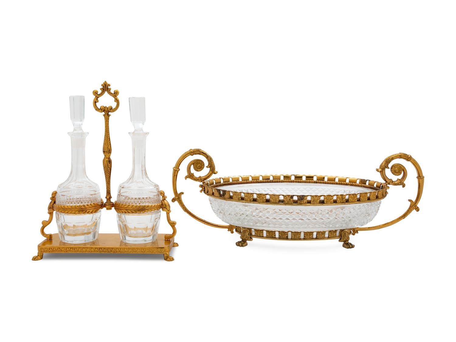 A Gilt Metal Mounted Cut Glass Bowl and a Similar Decanter Set