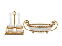 A Gilt Metal Mounted Cut Glass Bowl and a Similar Decanter Set