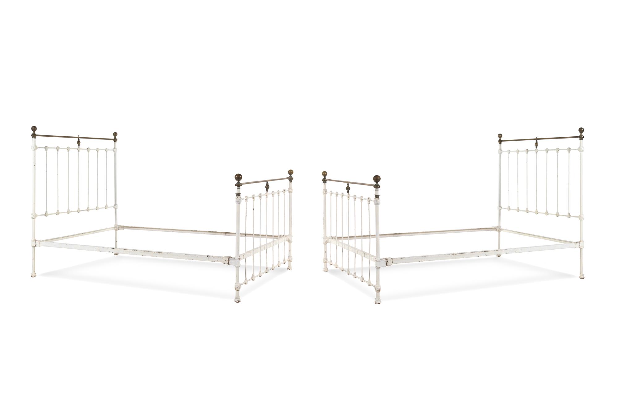 A Pair of Painted Iron Beds