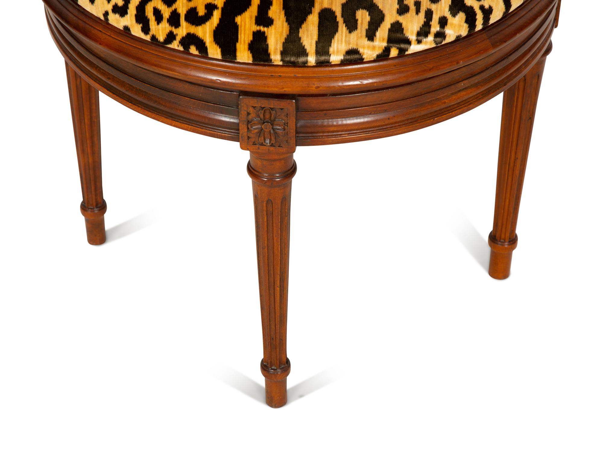 A Louis XVI Style Caned Bureau Chair