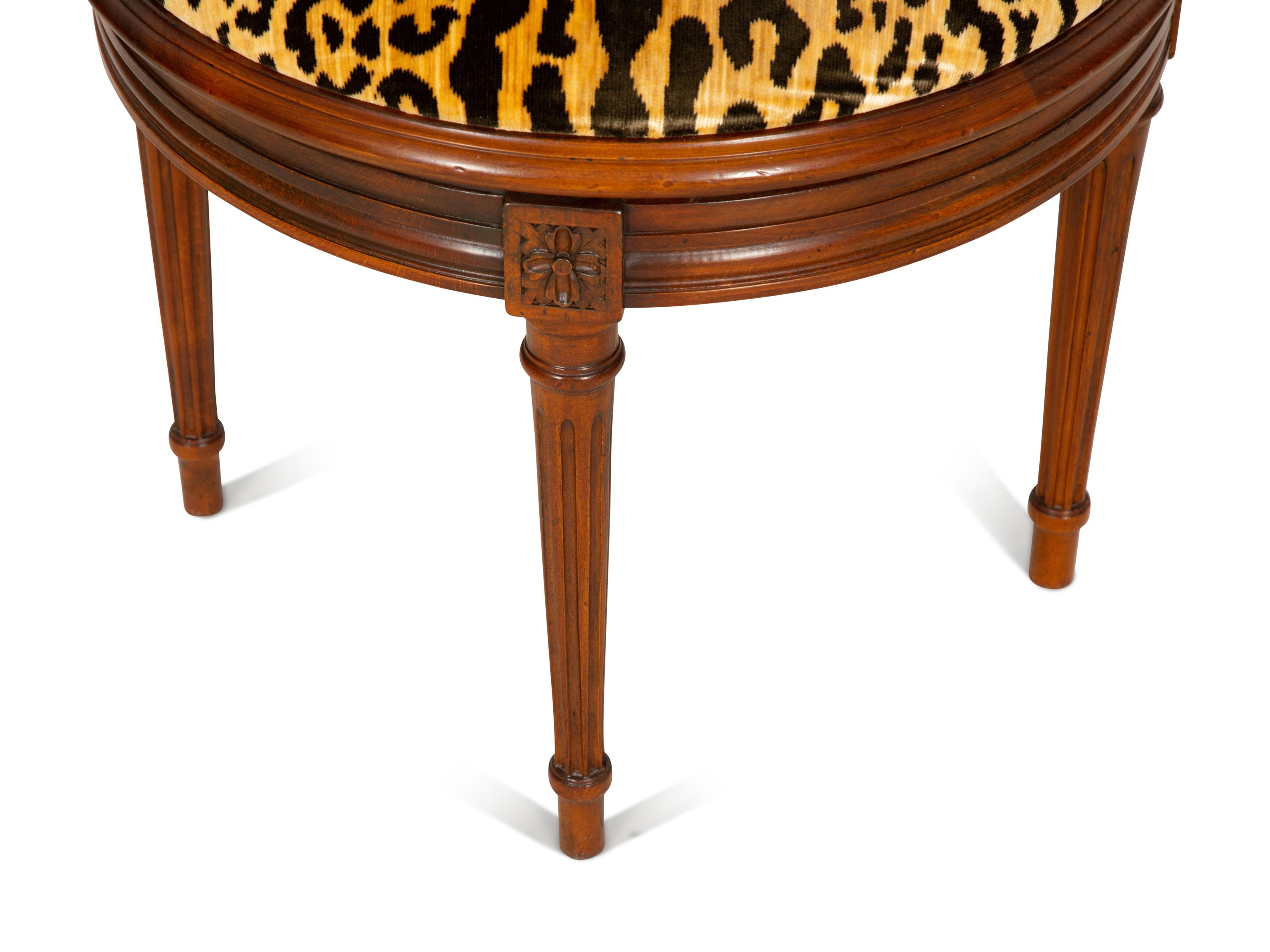 A Louis XVI Style Caned Bureau Chair