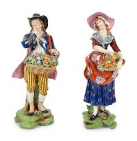 A Pair of Chelsea Porcelain Figures