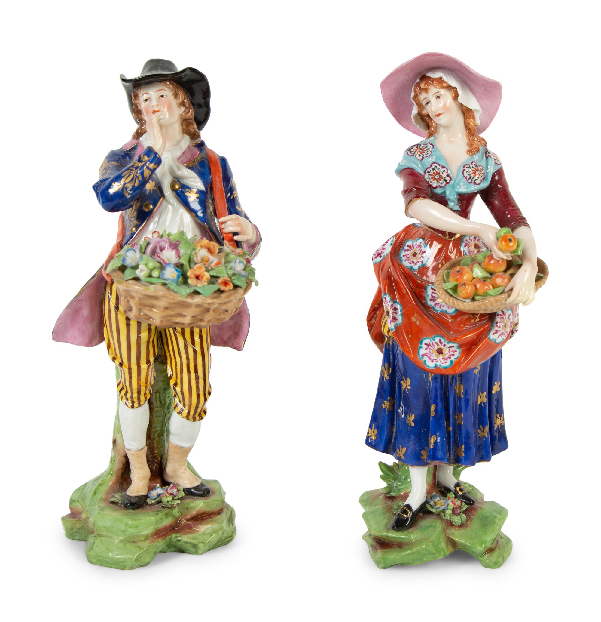 A Pair of Chelsea Porcelain Figures